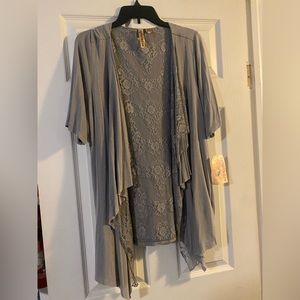 Brand new with tags, Macy’s. Over the shirt, cotton with lace.